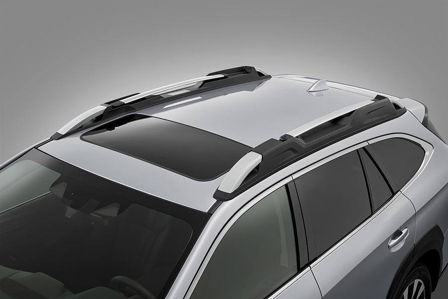 Tagrælinger med integreret, udtrækkeligt tagbøjlesystem på Subaru Outback.